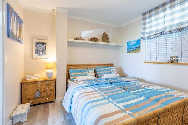 Schlafzimmer mit Doppelbett