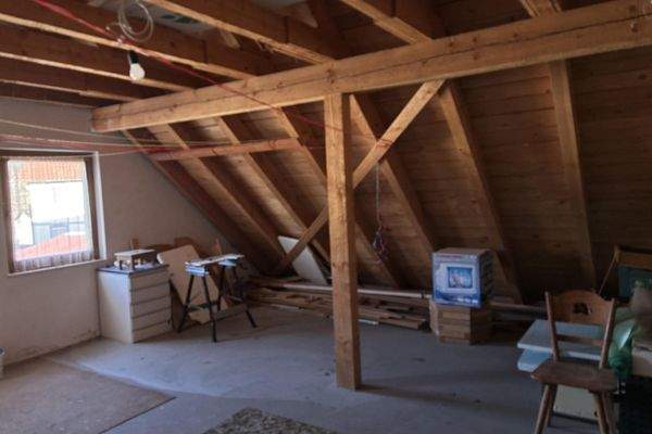 Walmdach über Garage als zusätzlichen Stauraum