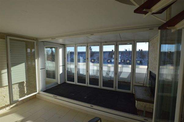 Wintergarten mit Kamin