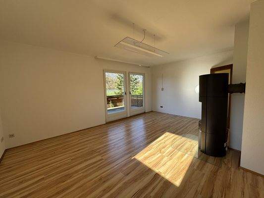 Wohnzimmer mit Zugang zur Terrasse