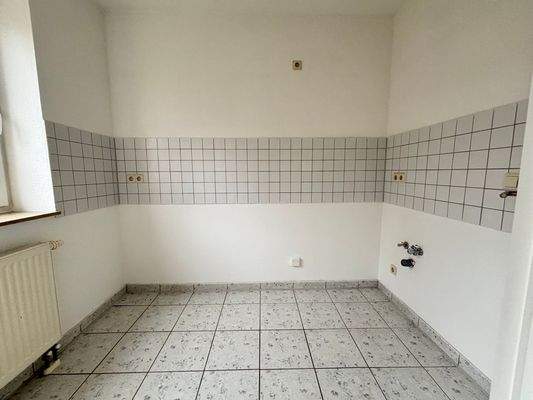 Küche mit Fliesenspiegel