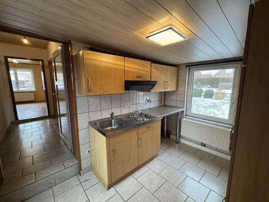 Hauswirtschaftsraum mit Einbauküche