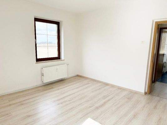 Schlafzimmer mit Blick Richtung Flurbereich