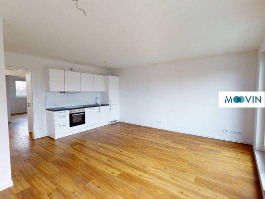 Ansicht IV: Wohn- und Esszimmer mit offenem Küchenbereich