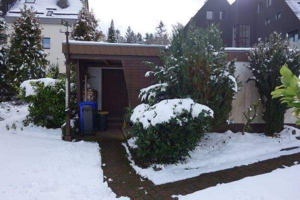 Werkstatt/Holzlager an den Garagen