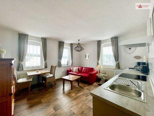 Wohnzimmer mit offener Küche 1.OG WE 3