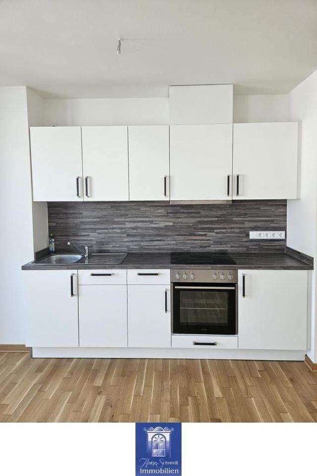 Wohntraum mit schönem Balkon, hochwertiger EBK und exklusivem Bad! - Photo 4