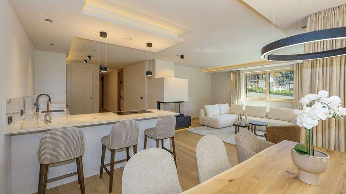 KITZIMMO-Luxuriöse Gartenwohnung mit eigenem Wellnessbereich - Immobilien Brixen.