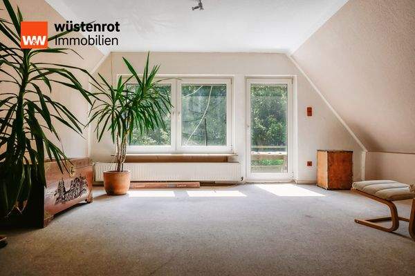 Schlafzimmer mit Ausstieg auf Balkon - Hauserweiterung