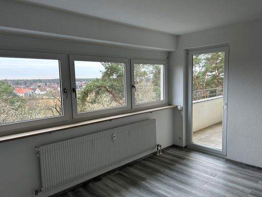 Wohnzimmer mit Balkon