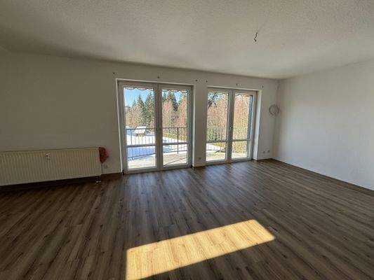 Wohnzimmer mit Balkon