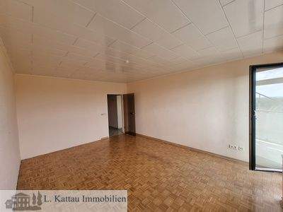 Wohnzimmer mit Parkett ausgelegt