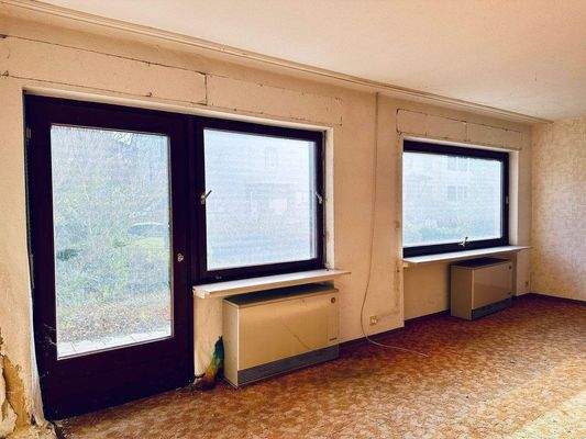 Wohnzimmer im EG mit Zugang zur Terrasse