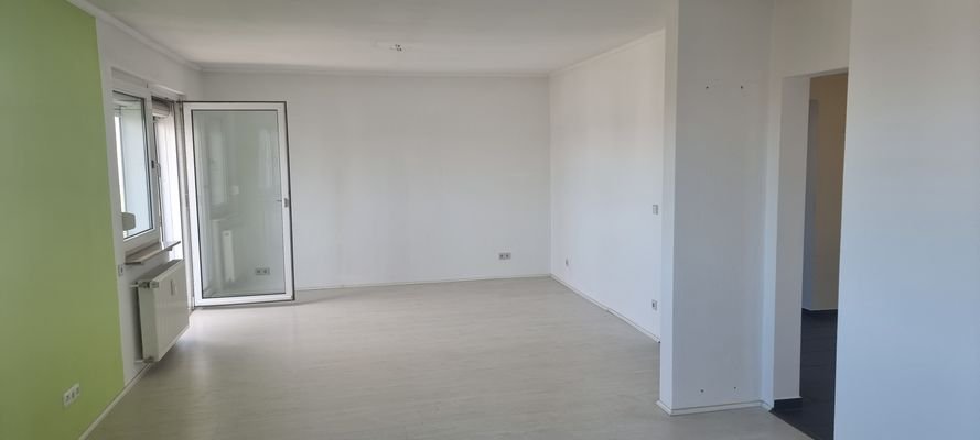 Wohnzimmer mit Ausgang Wintergarten