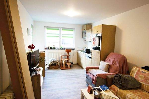 Wohnung 4 Wohnbereich mit Küchenzeile.jpg