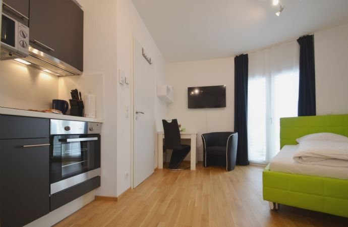 Kleine, feine 1-Zimmer-Wohnung, komplett ausgestattet, zentral in MÃ¶rfelden