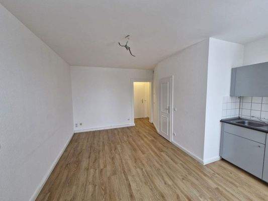 Wohnzimmer mit Küche