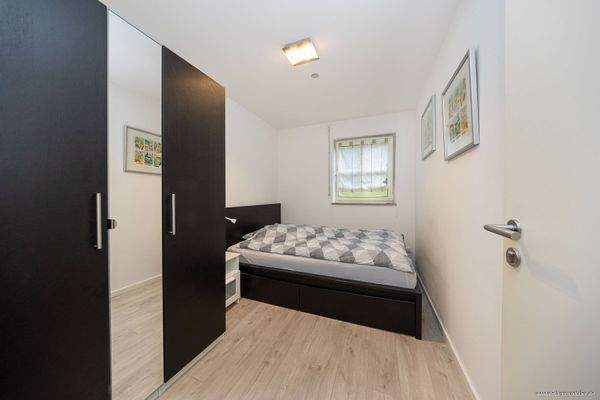 Einheit im Souterrain: Schlafzimmer