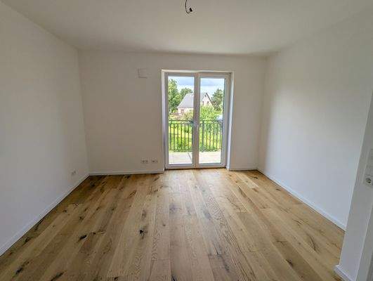 Schlafzimmer mit Balkonzugang