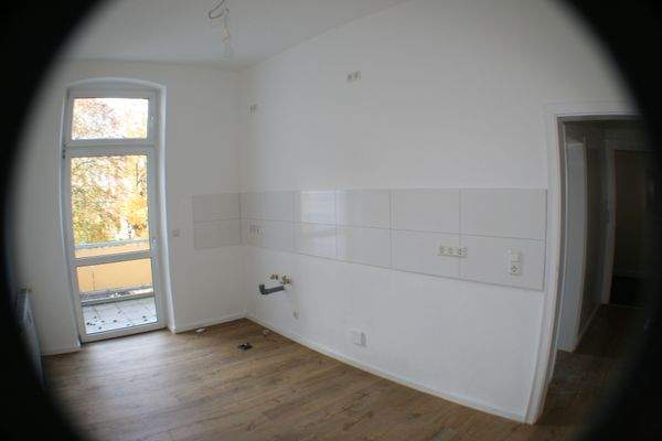 Whg., Küche mit Zugang zum Balkon