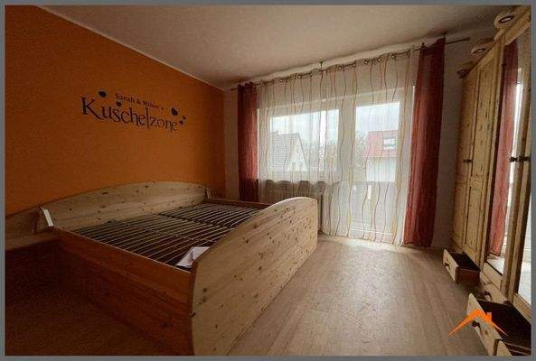 Schlafzimmer mit Balkon