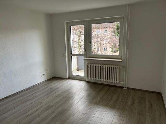 Wohnzimmer mit Balkon