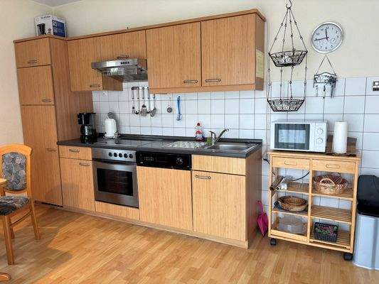 Kochbereich mit Einbauküche