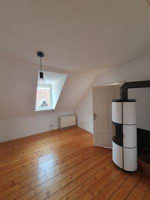 Wohnzimmer mit Holzofen