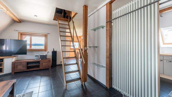 Treppe zum ausgebauten Dachspitz