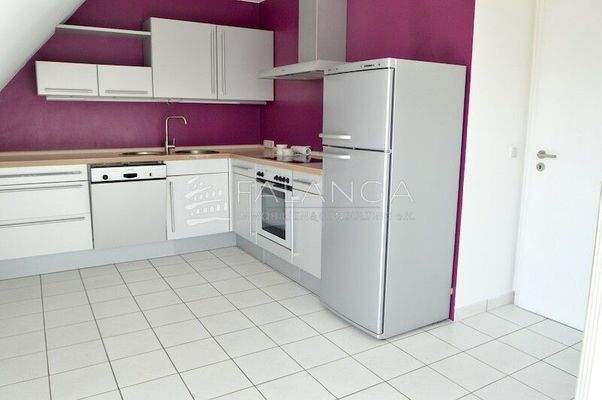 Wohnküche mit Zugang zum Sonnenbalkon