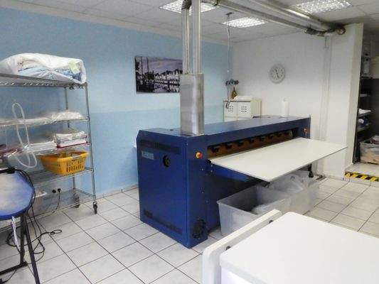 Textilreinigung und Heißmangel