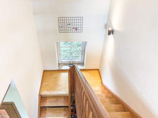 Treppenaufgang ins Obergeschoss