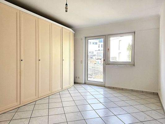 Schlafzimmer mit Balkonzugang