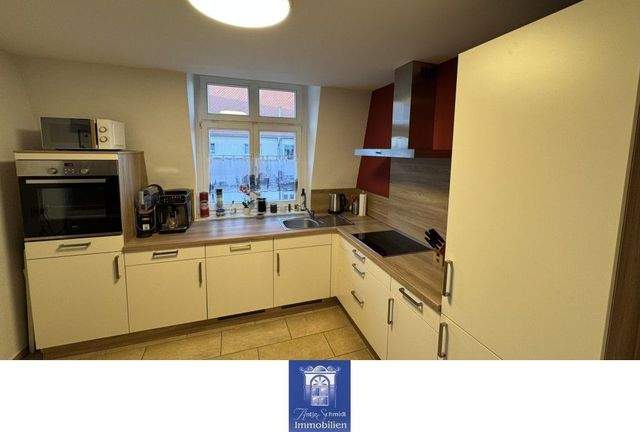 Geniale Dachgeschoss-Wohnung mit schönem Dielenboden und Bad mit Wanne! - Foto 2