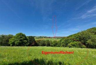 Blick auf den Ort und einige Eigentumsflächen