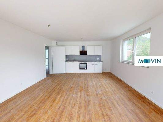 Ansicht III: Wohn- und Esszimmer mit offenem Küchenbereich