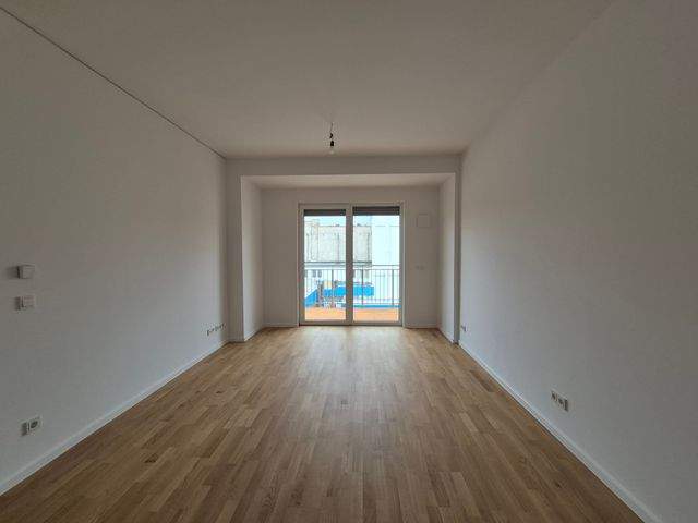 Schicke 2-Zimmer mit Parkett, Balkon, Einbauküche, Fußbodenheizung u. Stellplatz - Photo 1