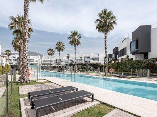 Elegant 3-Bedroom Townhouse with Communal Pool in Estepona