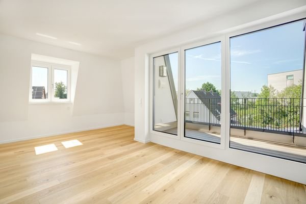 Schlafzimmer mit Balkon.