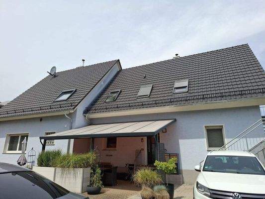 Eingang Erdegeschosswohnung und Freisitz