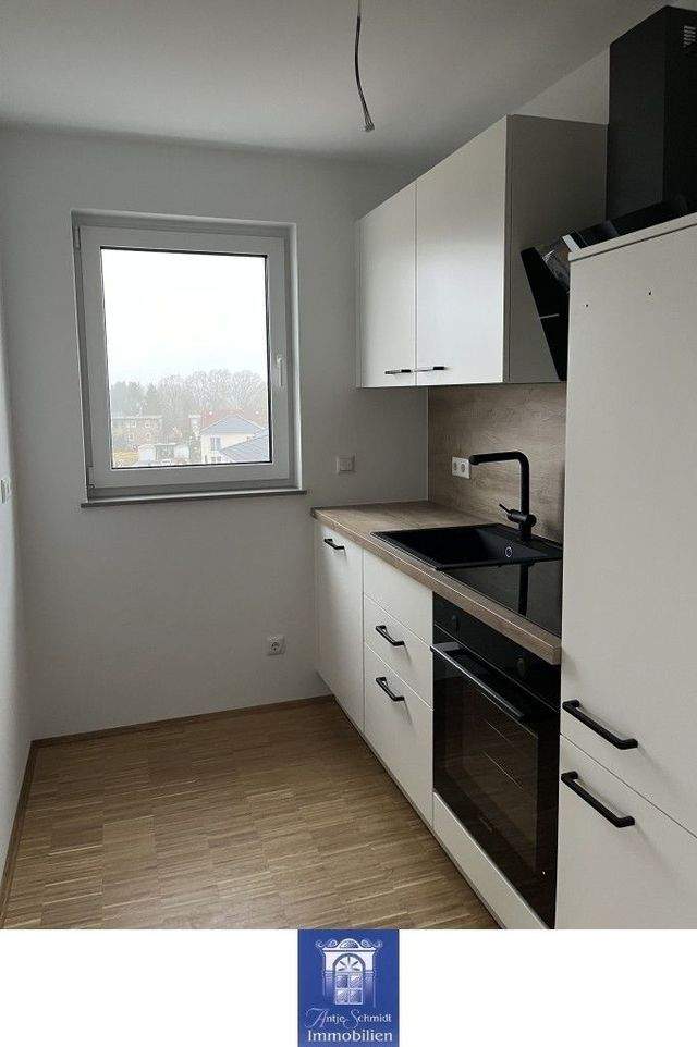 Willkommen im modernen Erstbezug! Perfekter Zuschnitt, EBK, schöner Balkon und Lift! - Photo 3