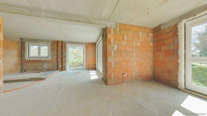 EG I Wohnzimmer mit Blick zum Essbereich und Küche