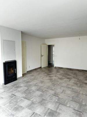 Wohnzimmer mit Kamin