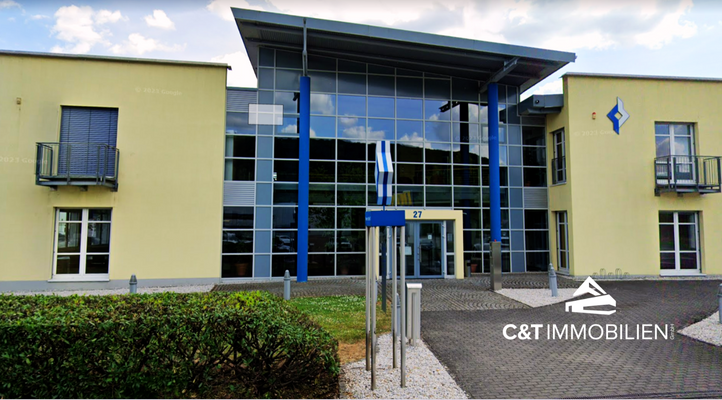 Außenansicht C&amp;T mit Logo.png