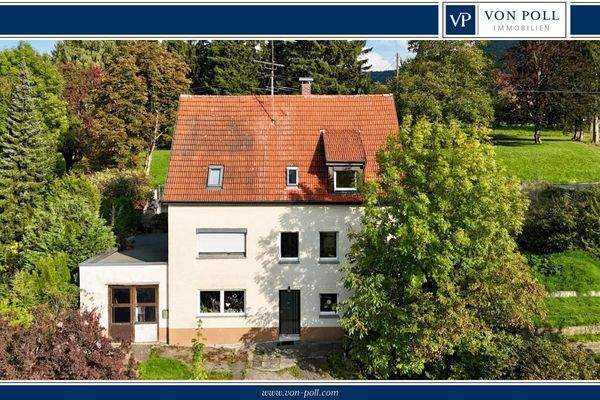 Zweifamilienhaus + Gewerbe