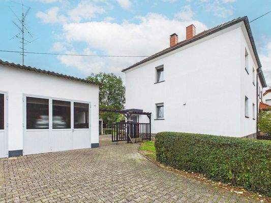 Ein-/Zweifamilienhaus mit Werkstatt in SB-Ensheim