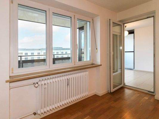 Beispiel I Wohnzimmer mit Blick zum Wintergarten I Wohnmodell W.3