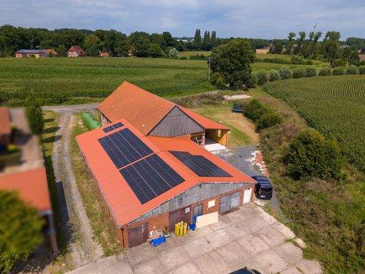 Werkstatt mit PV Anlage und künftiges Wohnhaus