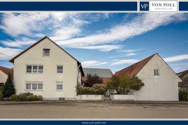 MFH mit Nebengebäude und PV