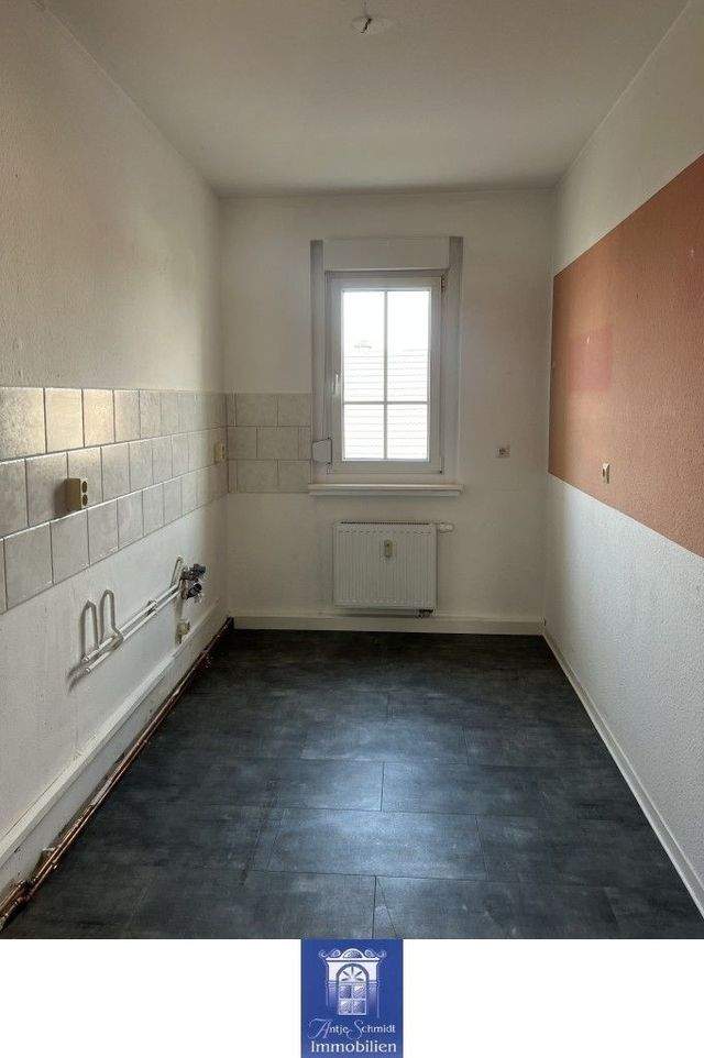 Perfekte Familienwohnung mit schönem Balkon in ländlicher grüner Umgebung! - Photo 1